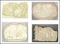 Mayan Wind God - four stamp samples trying out materials and methods to create the best cookie stamps - stamp in the second image works best