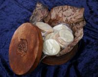 “The Essence Within” signature symbol, round 8 x 8 x 4 ” Gift Container with hand-painted paper, vaccuum sealed. Includes all detailed literature