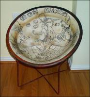 Mayan Bowl Chair - 129 x 129 x 129 inches, refurbished 1960’s lawn chair with layers of woven canvas strips, white glue, and wall plaster, Acrylic paints, marker, varnish, waxed for durability.