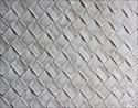 Woven canvas strips, 24 x 24 inches